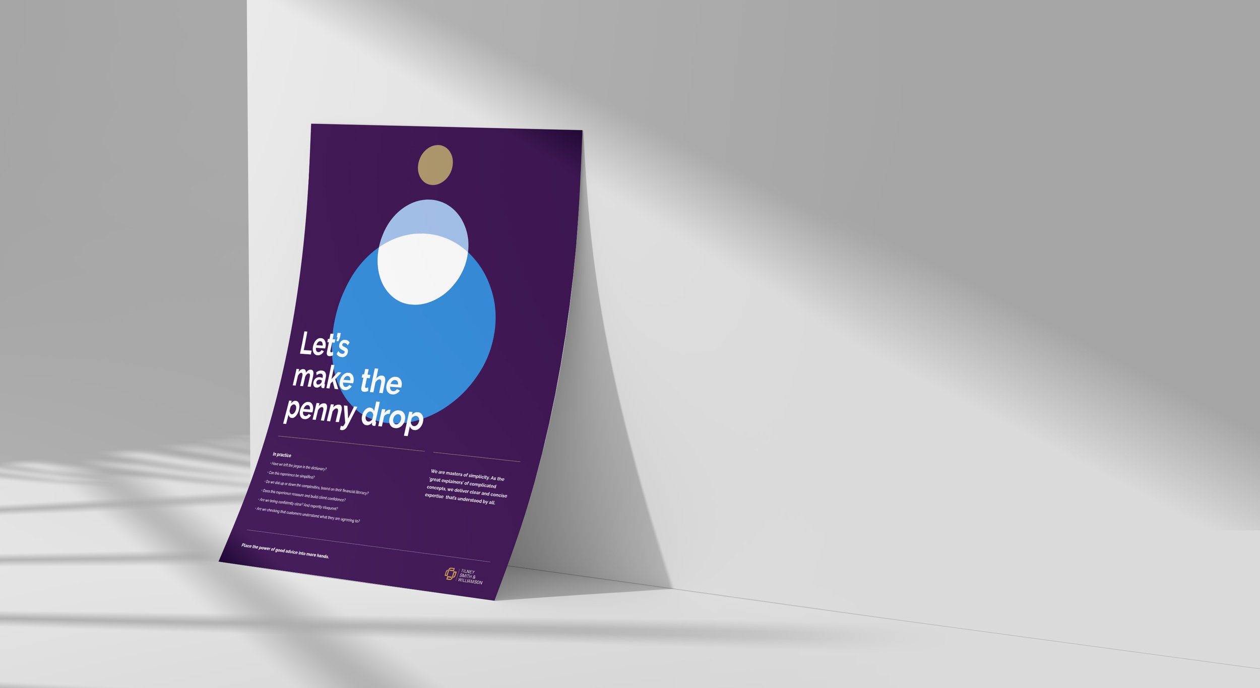 A purple poster hanging on a white wall.